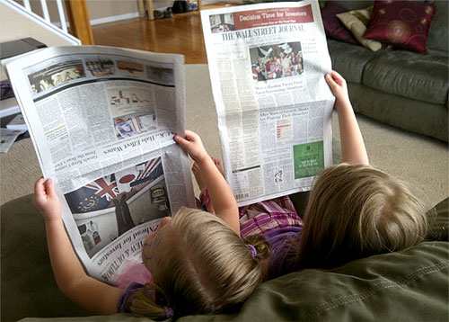 girls reading wall street journal