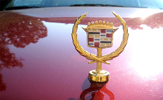gold cadillac symbol