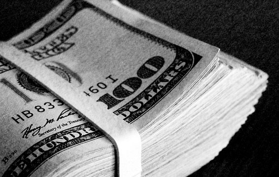 stack $100 dollar bills