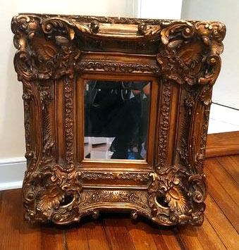 gold ornate mirror