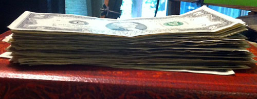 stack of two dollar bills