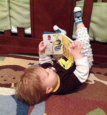 upside down reading baby